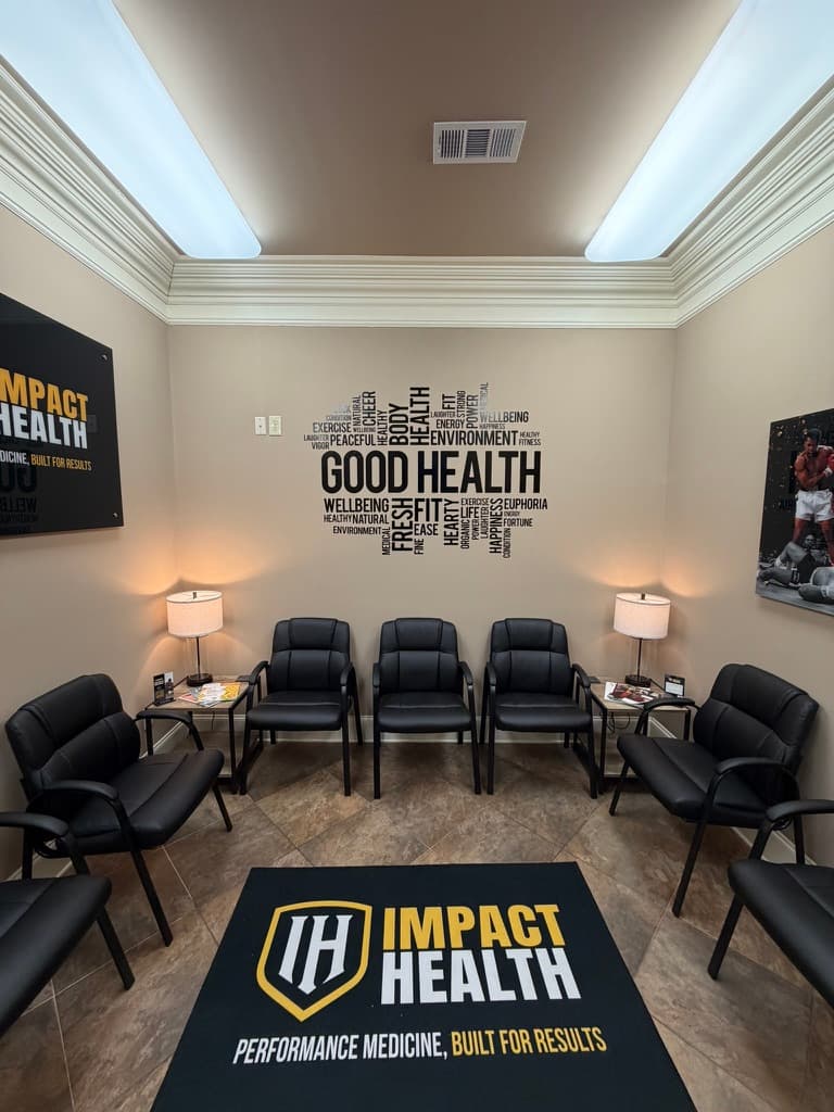 Oxford waiting room — centered on the GOOD HEALTH wall mural with leather chairs