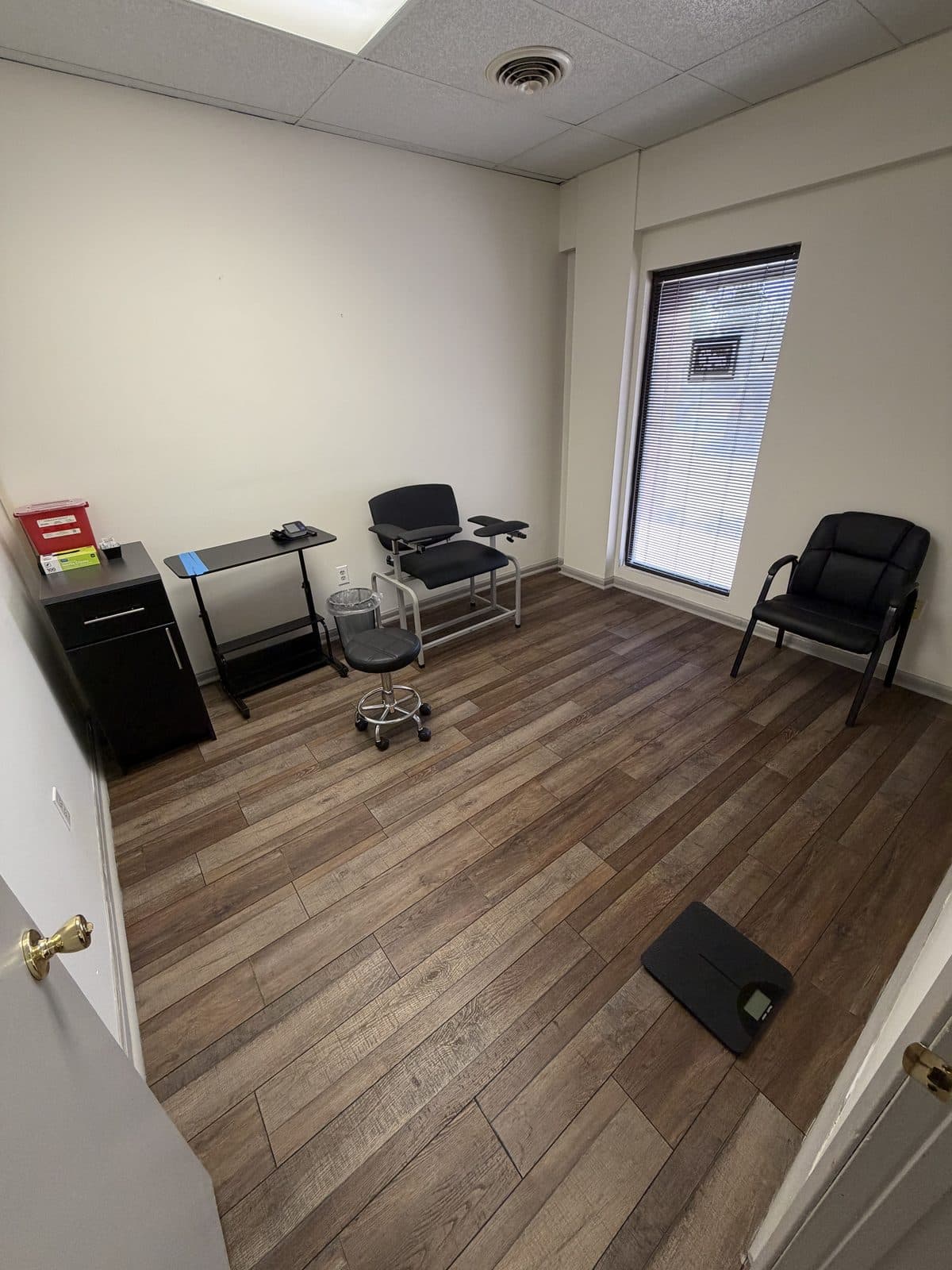 Private exam room at Impact Health Tupelo with natural light